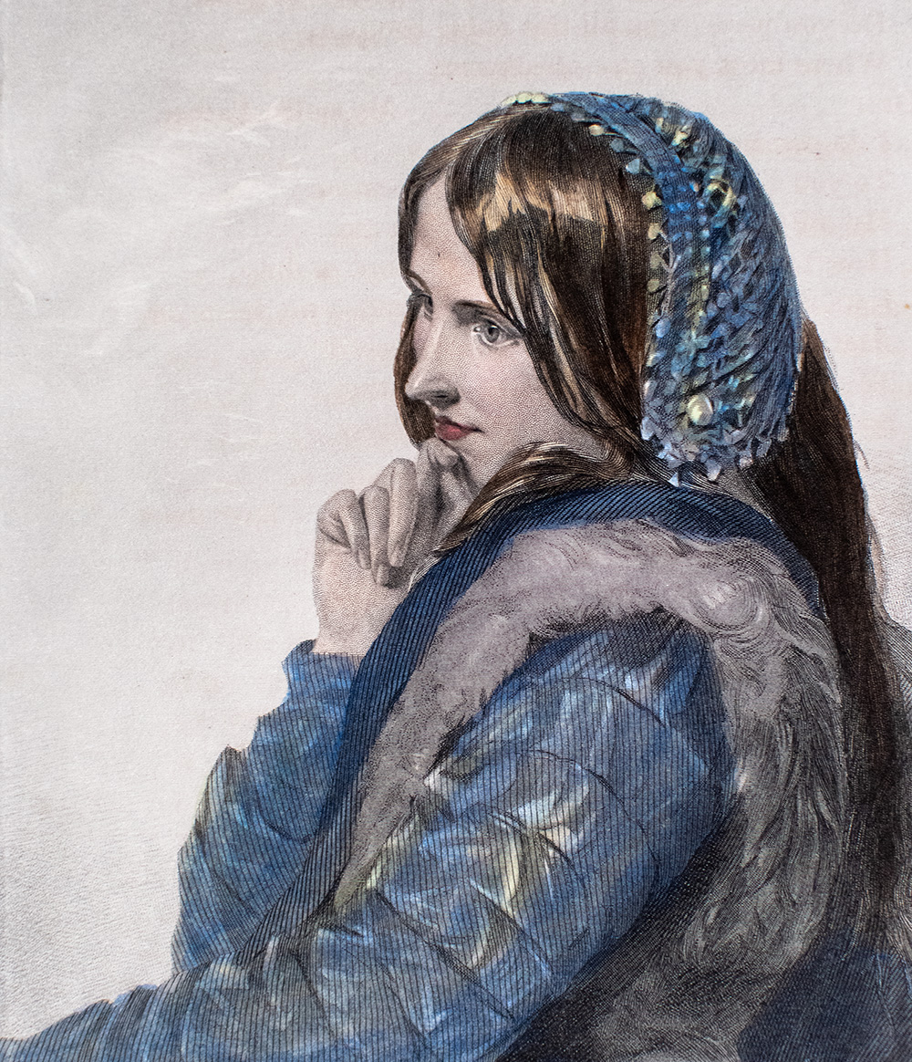 Young Woman Wearing a Blue Patterned Headscarf