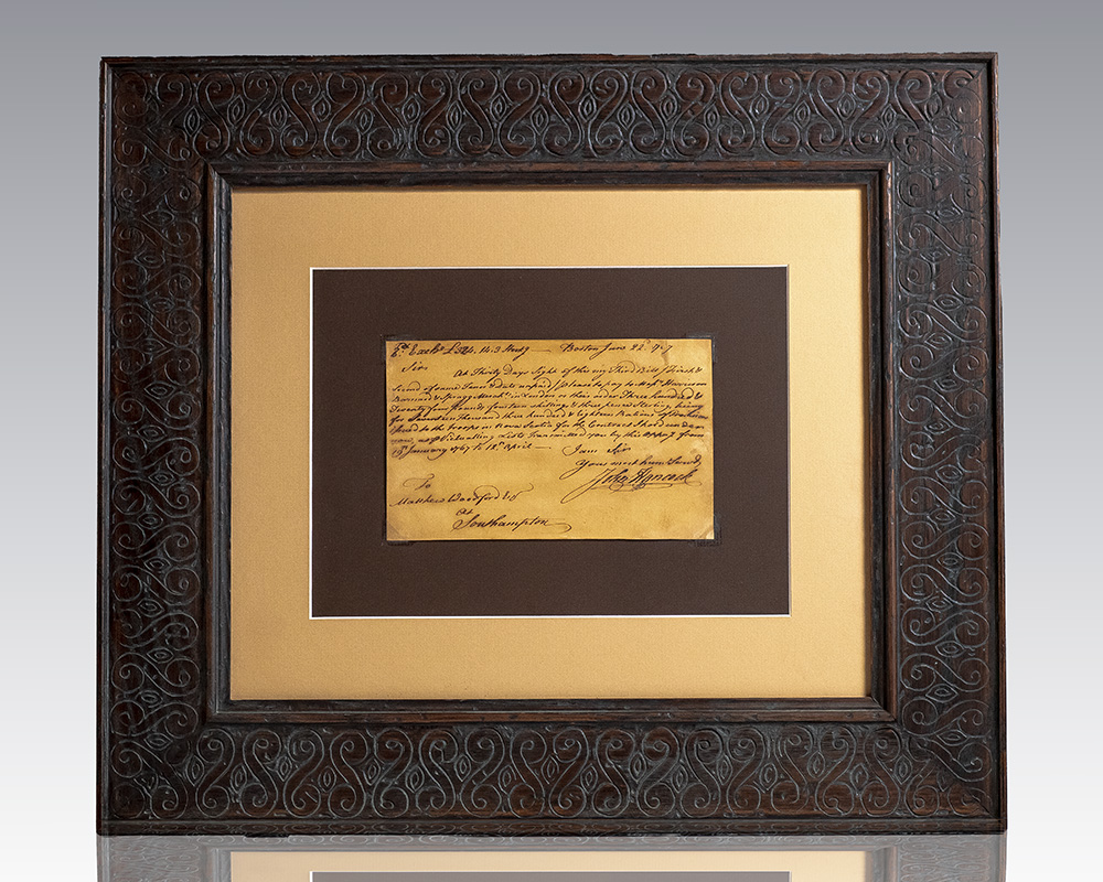 Framed handwritten historical letter displayed