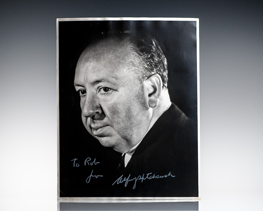 Black-and-white portrait photograph of a man in a suit