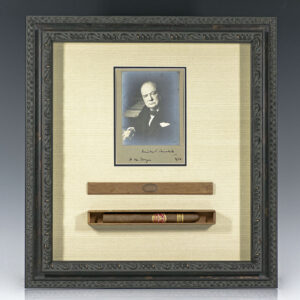 Original black and white photograph of Winston S. Churchill inscribed by him and accompanied by an exceptionally rare unsmoked Winston S. Churchill brand La Corona Cigar