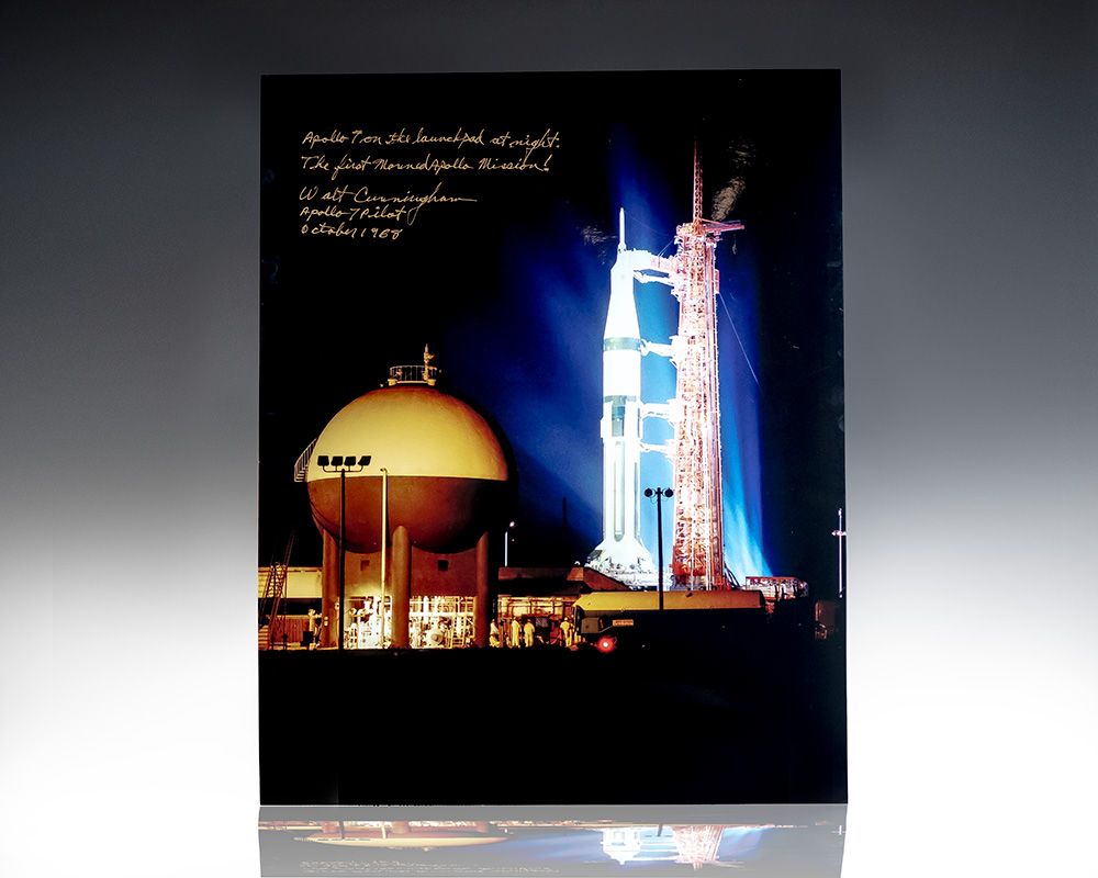 Walter Cunningham Signed Night Photograph of Apollo 7 on Launch Pad.