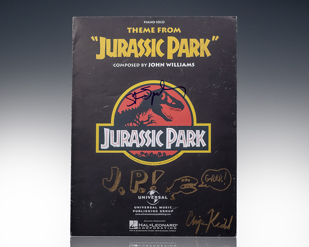 Sheet Music for Jurassic Park; Signed by Director Steven Spielberg and by Chip Kidd with an original drawing
