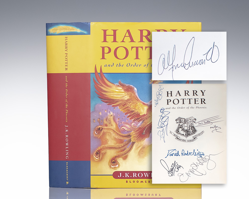 J.K. Rowling's Harry Potter and the Order of the Phoenix; signed by several members of the film cast including Daniel Radcliffe, Rupert Grint, Emma Watson, Tom Felton, and director Alfonso Cuarón