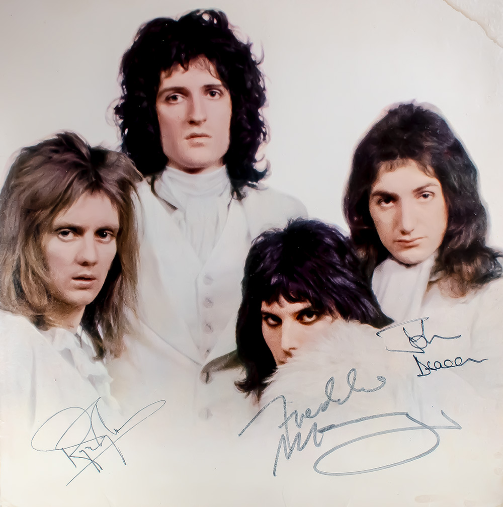 Freddie Mercury, Roger Taylor, and John Deacon Signed Queen II Album.