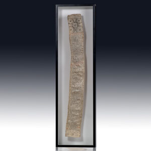 Framed ancient manuscript