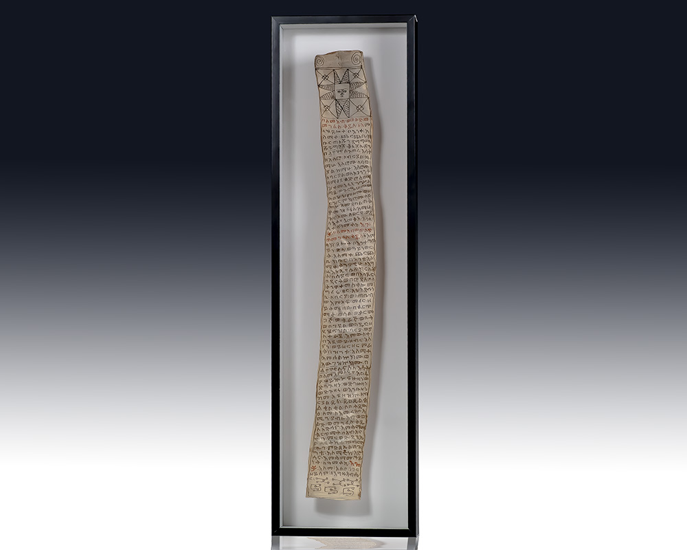 Framed ancient manuscript