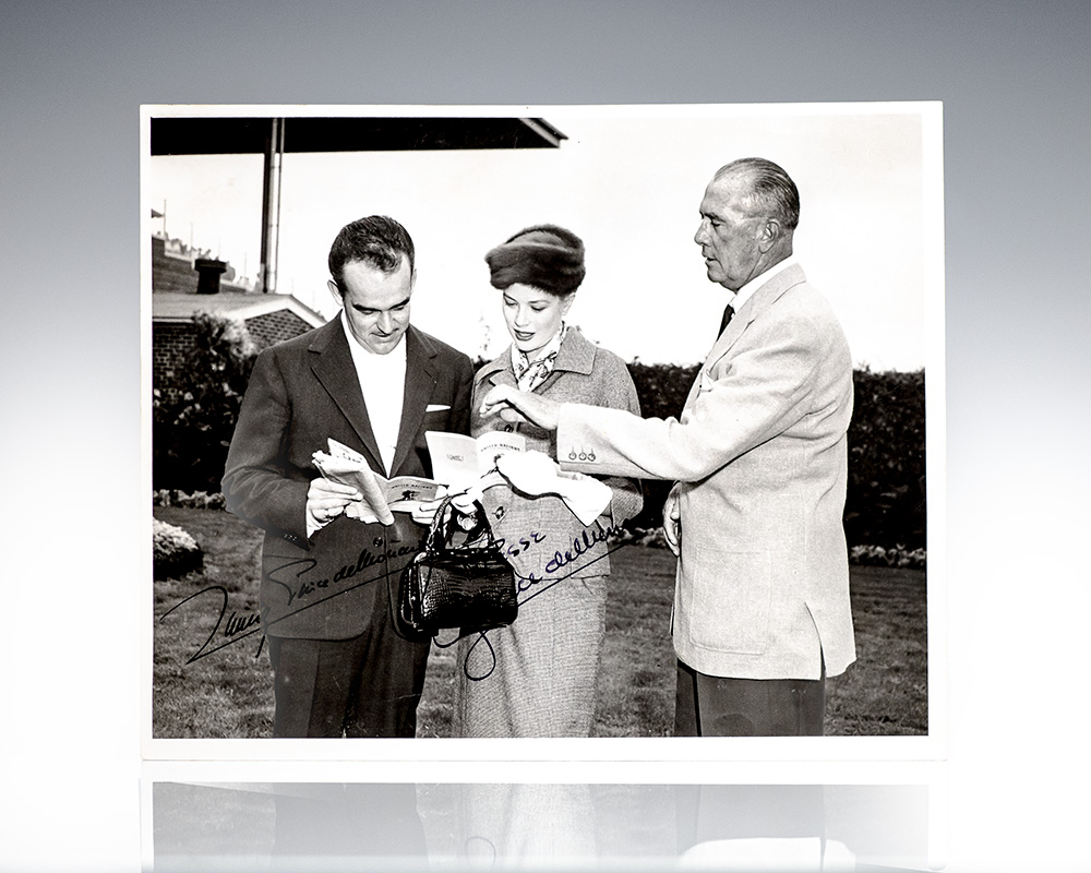 Black and white photo of three people outdoors