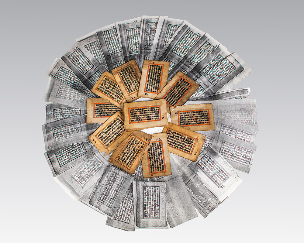 Ancient manuscript pages arranged in a circular pattern