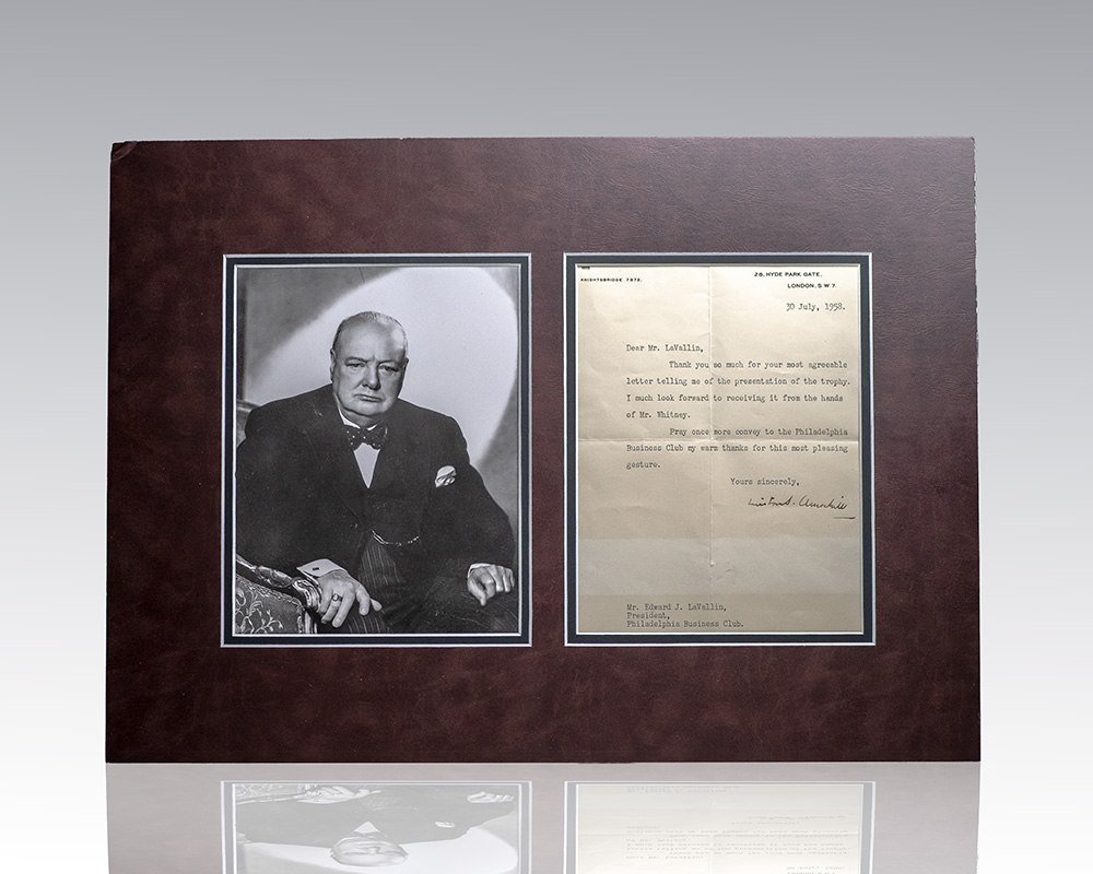 Framed display featuring a portrait of Winston Churchill