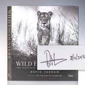 Wild Encounters: Iconic Photographs of the World's Vanishing Animals and Cultures.