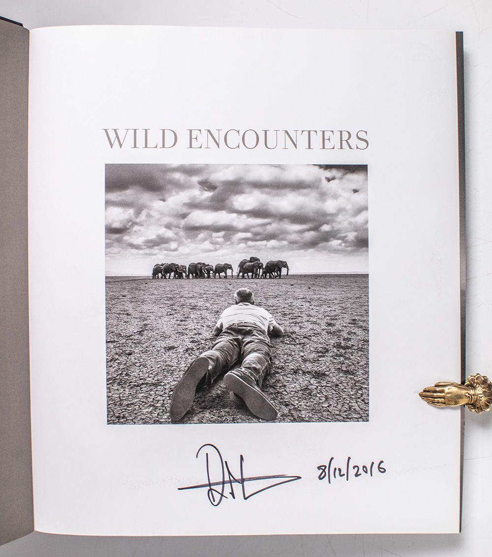 Wild Encounters: Iconic Photographs of the World's Vanishing Animals and Cultures.