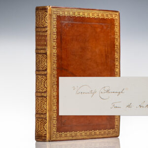 Antique leather-bound book with author’s handwritten note