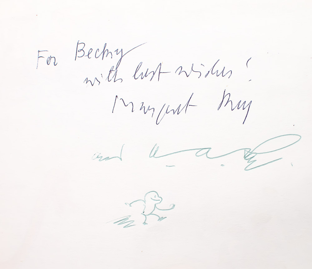 Curious George Rides a Bike.