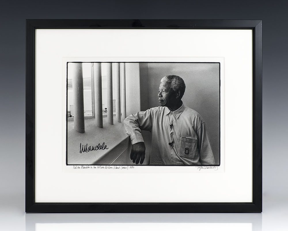 Silver Gelatin Print of Nelson Mandela at Robben Island; signed by Mandela and photographer Jurgen Schadeberg