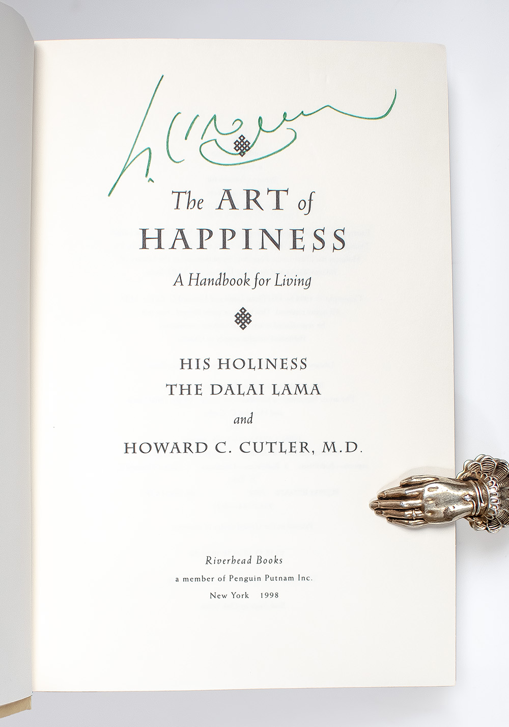 The Art of Happiness: A Handbook For Living.