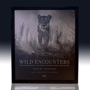 Wild Encounters: Iconic Photographs of the World's Vanishing Animals and Cultures.