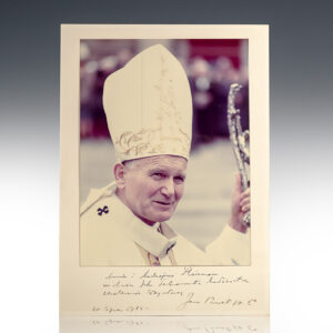 Catholic Clergyman in Ceremonial Attire Holding a Staff,