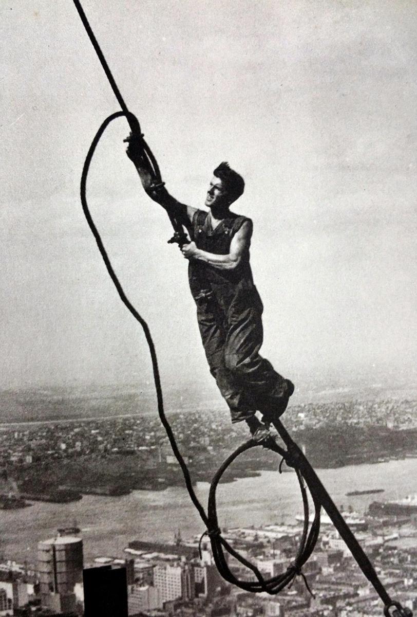 Men at Work: Photographic Studies of Men and Machines