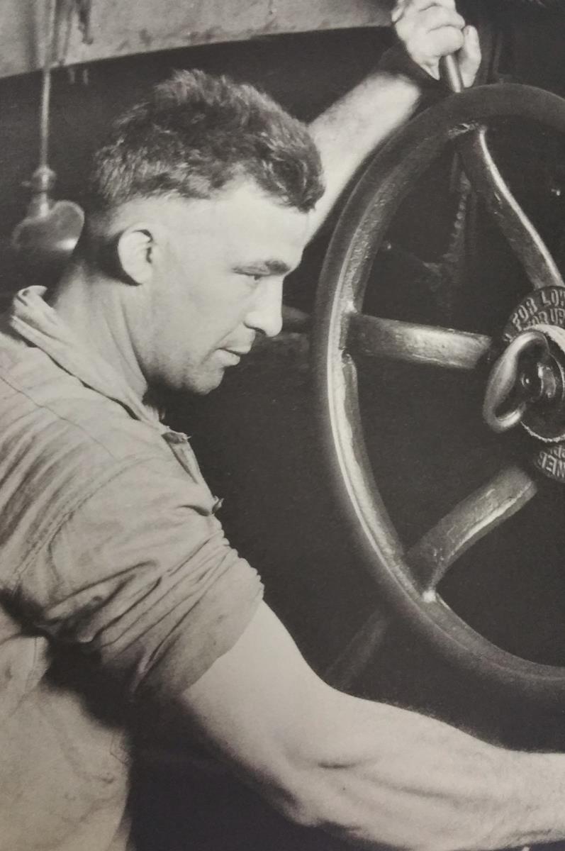 Men at Work: Photographic Studies of Men and Machines