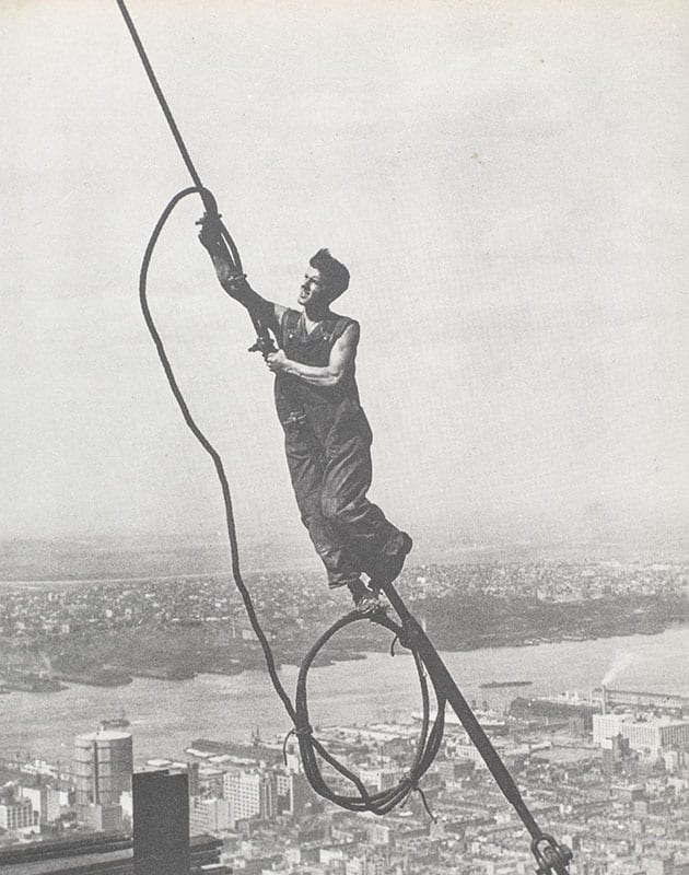 Men at Work: Photographic Studies of Men and Machines