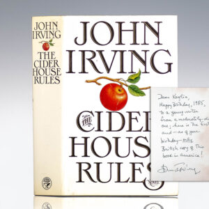 "Happy Birthday, 1985, to a young writer from a moderately-old one; here is the first and-as of your birthday-only British copy of this book in America!": First Edition of The Cider House Rules; With a Full Page Inscription by John Irving