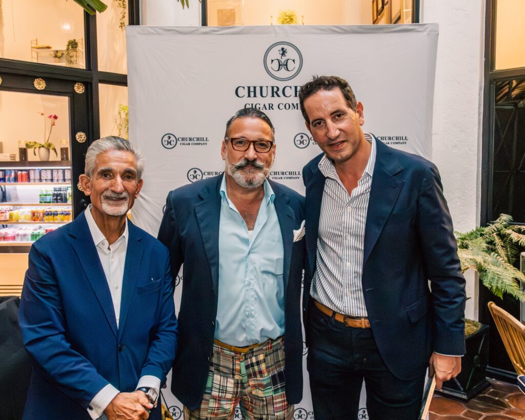 Ted Leonisis, Chip Kidd, and Matthew Raptis at Churchill Cigar Company in Palm Beach