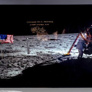 Large photograph of Neil Armstrong on the moon during the Apollo 11 mission; signed by Capsule Communicator Charlie Duke